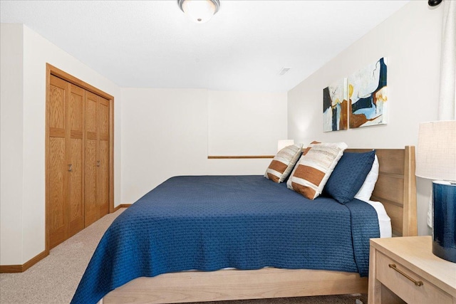 2222 White Oak Ct, Hudson, WI 54016 - carpeted bedroom featuring baseboards and a closet