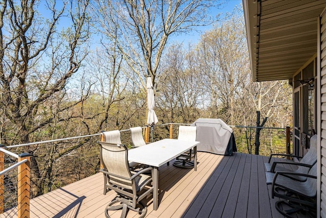 2222 White Oak Ct, Hudson, WI 54016 - wooden deck featuring outdoor dining space and grilling area