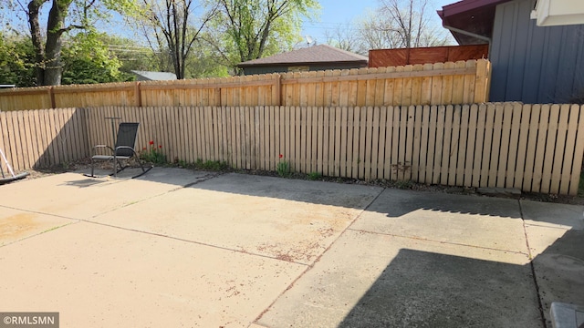 view of patio featuring a fenced backyard
