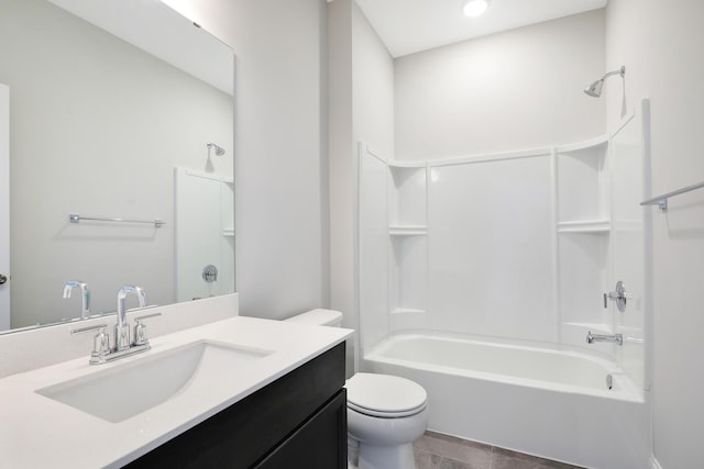 full bath with vanity, tub / shower combination, and toilet