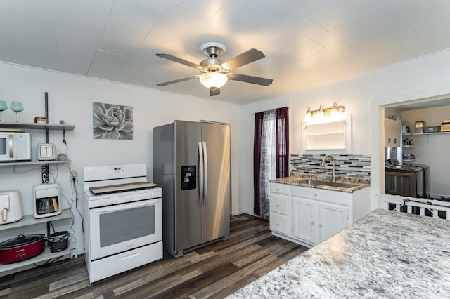 15 2nd St SE, Dodge Center, MN 55927 - kitchen featuring a sink, white appliances, dark wood-type flooring, ceiling fan, and white cabinets