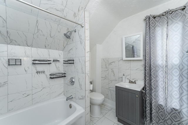 15 2nd St SE, Dodge Center, MN 55927 - full bathroom with lofted ceiling, toilet, marble finish floor, vanity, and bathtub / shower combination