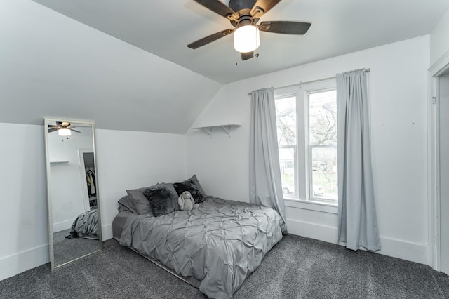 15 2nd St SE, Dodge Center, MN 55927 - carpeted bedroom with vaulted ceiling, ceiling fan, and multiple windows