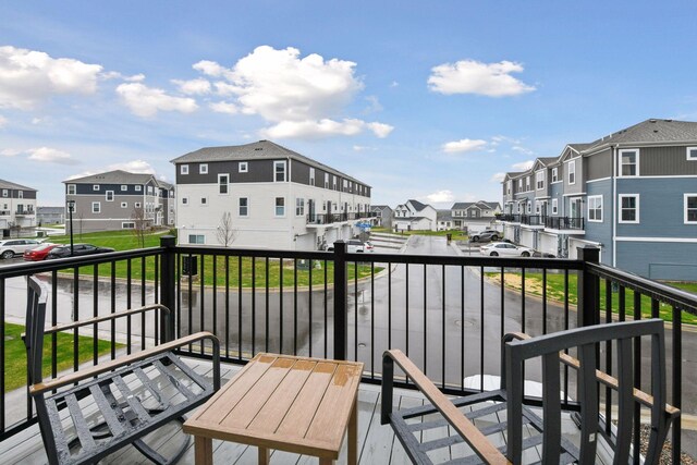 balcony featuring a residential view