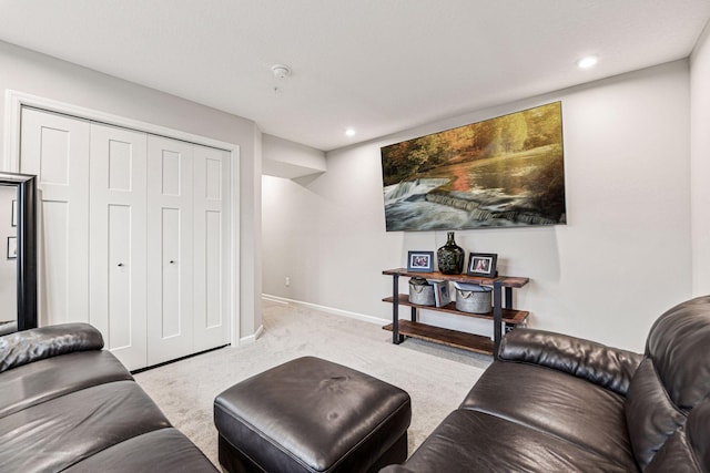 living area with carpet flooring, recessed lighting, and baseboards