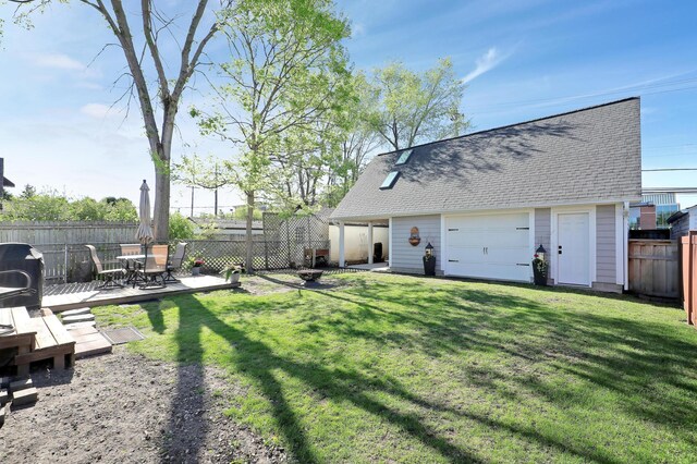 2102 Pinehurst Ave, Saint Paul, MN 55116 - view of yard featuring an outbuilding and a garage