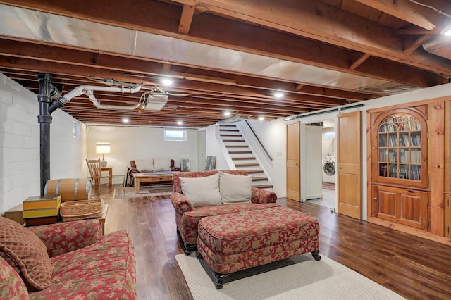2102 Pinehurst Ave, Saint Paul, MN 55116 - living room with washer / clothes dryer, stairway, and wood-type flooring
