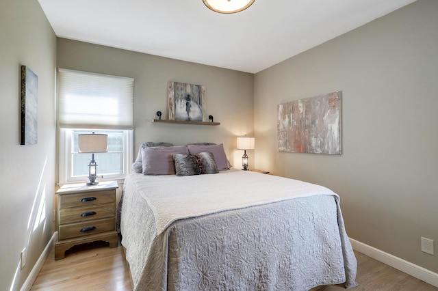 2102 Pinehurst Ave, Saint Paul, MN 55116 - bedroom with light wood-style floors and baseboards