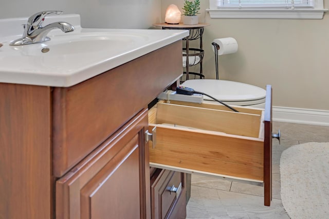 2102 Pinehurst Ave, Saint Paul, MN 55116 - bathroom featuring vanity and baseboards