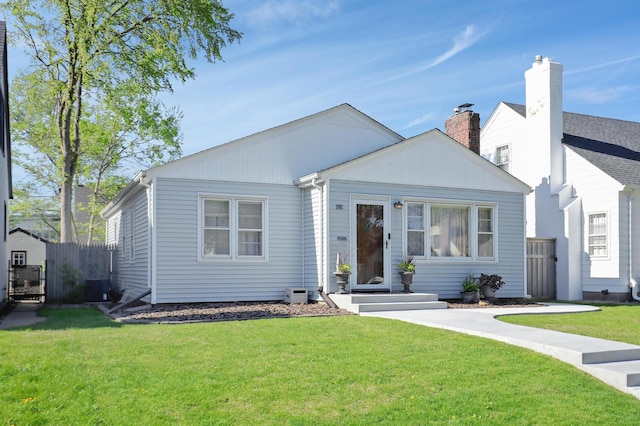 2102 Pinehurst Ave, Saint Paul, MN 55116 - view of front of property featuring a gate and central AC