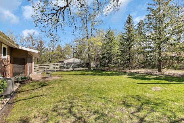 view of yard featuring fence
