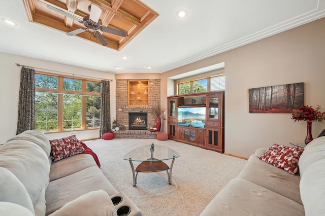 2374 Thrush St, Shakopee, MN 55379 - carpeted living room featuring ornamental molding, healthy amount of natural light, a ceiling fan, a brick fireplace, and recessed lighting
