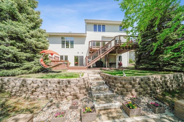 2374 Thrush St, Shakopee, MN 55379 - back of property with stairway and a wooden deck