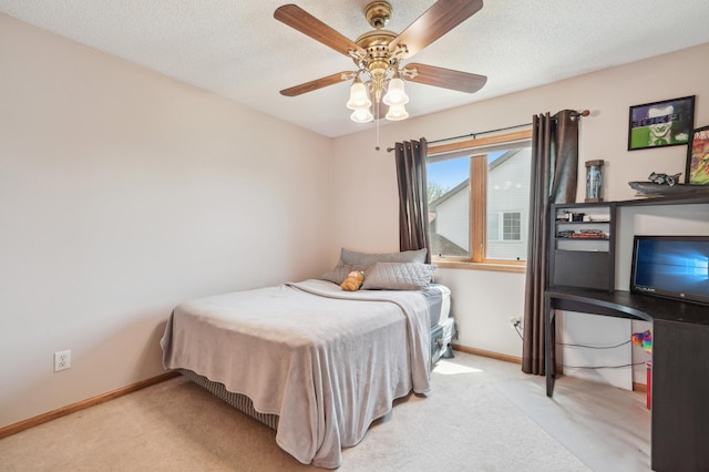 2374 Thrush St, Shakopee, MN 55379 - bedroom with carpet floors, baseboards, ceiling fan, and a textured ceiling