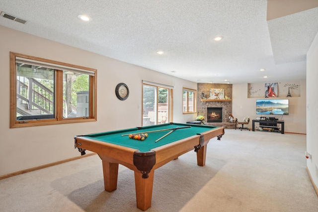 2374 Thrush St, Shakopee, MN 55379 - rec room with carpet flooring, plenty of natural light, a textured ceiling, billiards table, and a fireplace