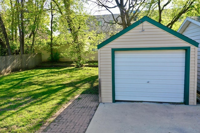 detached garage with fence