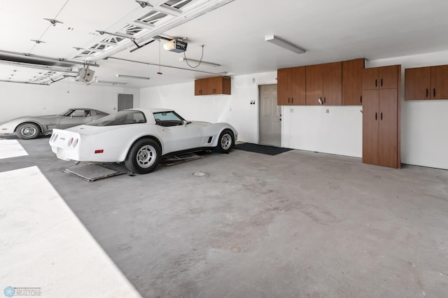 garage featuring a garage door opener