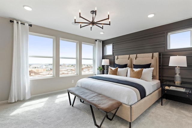 bedroom with baseboards, recessed lighting, carpet, and a notable chandelier