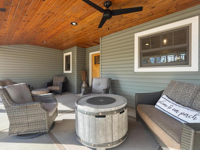 1535 148th Ln NE, Ham Lake, MN 55304 - view of patio / terrace featuring ceiling fan and a fire pit