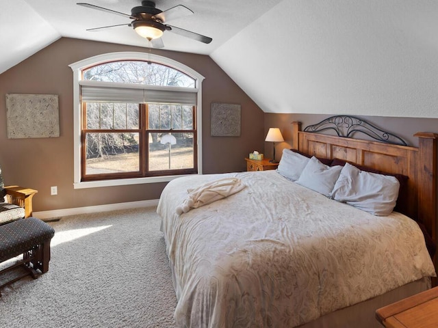 1535 148th Ln NE, Ham Lake, MN 55304 - carpeted bedroom with lofted ceiling, baseboards, and ceiling fan