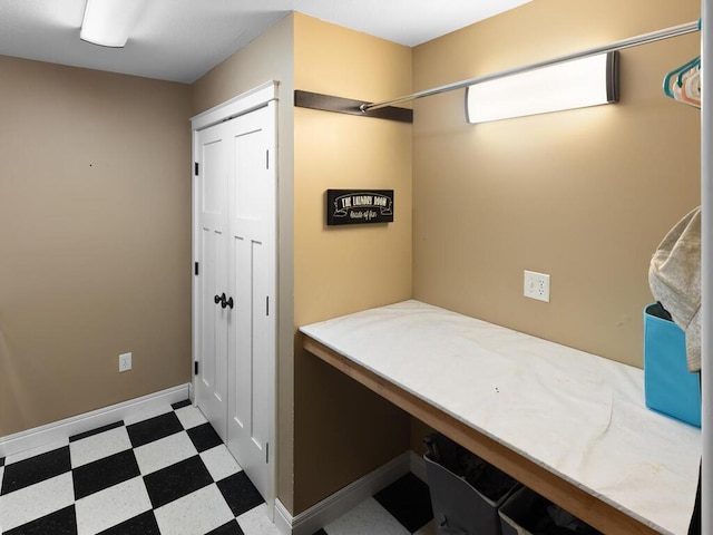 1535 148th Ln NE, Ham Lake, MN 55304 - clothes washing area featuring tile patterned floors and a desk