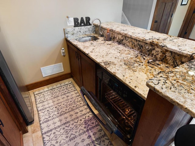1535 148th Ln NE, Ham Lake, MN 55304 - bathroom featuring a sink and baseboards