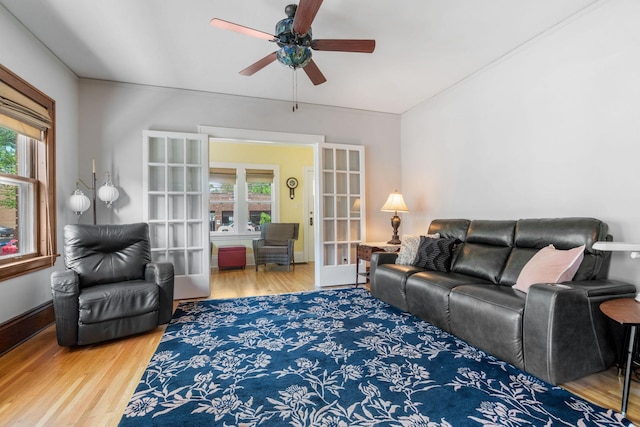 1520 Randolph Ave, Saint Paul, MN 55105 - living area featuring french doors, wood finished floors, and healthy amount of natural light