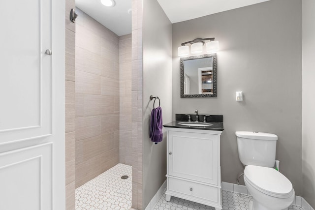 1520 Randolph Ave, Saint Paul, MN 55105 - bathroom featuring walk in shower, vanity, toilet, baseboards, and tile patterned flooring