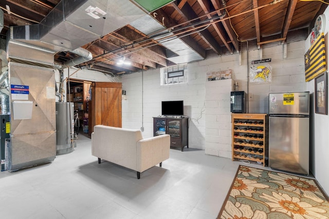 1520 Randolph Ave, Saint Paul, MN 55105 - unfinished basement with freestanding refrigerator, gas water heater, heating unit, and concrete block wall