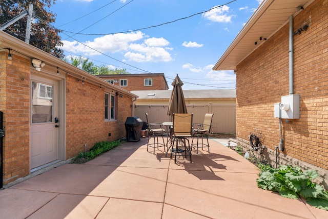 1520 Randolph Ave, Saint Paul, MN 55105 - view of patio featuring outdoor dining area and grilling area