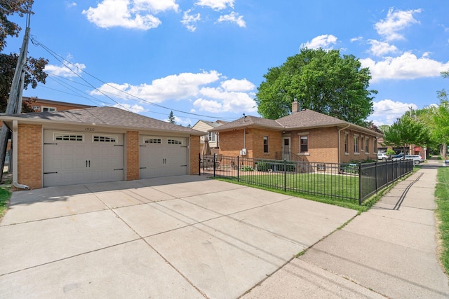 1520 Randolph Ave, Saint Paul, MN 55105 - view of front facade featuring brick siding, a detached garage, an outdoor structure, and a chimney