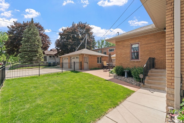 1520 Randolph Ave, Saint Paul, MN 55105 - view of yard with an outbuilding, a garage, and a patio area