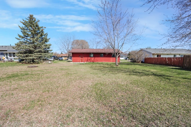 view of yard with fence