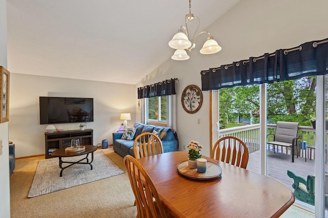 1060 Aston Cir, Burnsville, MN 55337 - carpeted dining space with vaulted ceiling and a chandelier