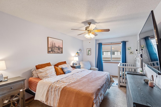 1060 Aston Cir, Burnsville, MN 55337 - carpeted bedroom with a ceiling fan and a textured ceiling