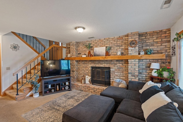 1060 Aston Cir, Burnsville, MN 55337 - living area with carpet floors, stairs, a textured ceiling, and a brick fireplace