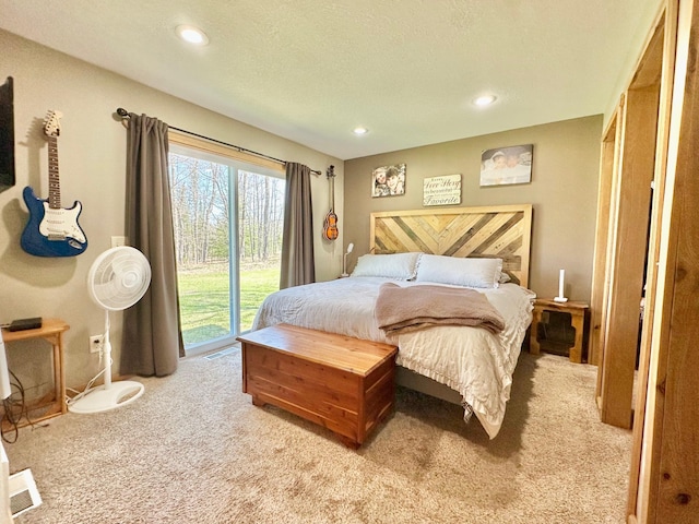 bedroom featuring access to outside, light carpet, and recessed lighting