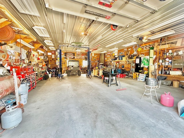 garage with a workshop area