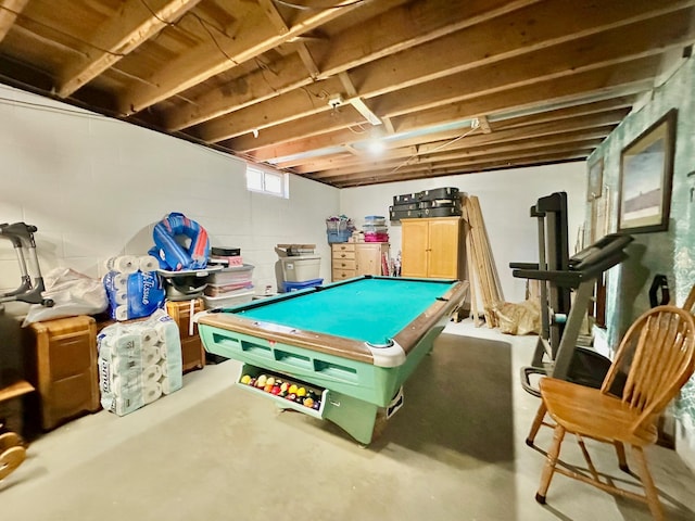 game room with concrete floors and pool table