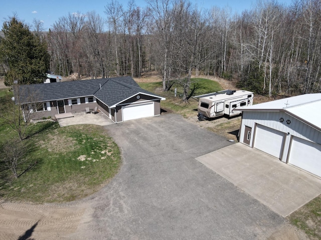 view from above of property featuring a forest