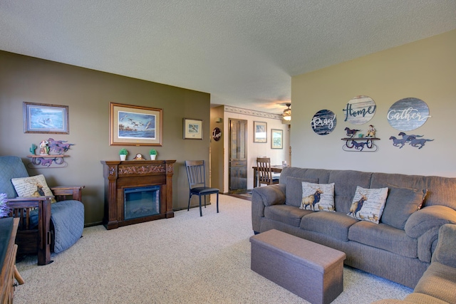 living room with carpet and a textured ceiling