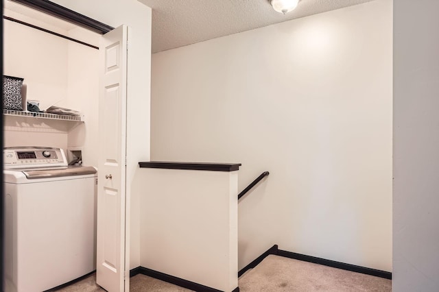 2492 Yellowstone Dr Unit 82, Hastings, MN 55033 - washroom featuring washer / clothes dryer, carpet floors, a textured ceiling, and baseboards