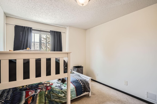 2492 Yellowstone Dr Unit 82, Hastings, MN 55033 - carpeted bedroom with a textured ceiling and baseboards