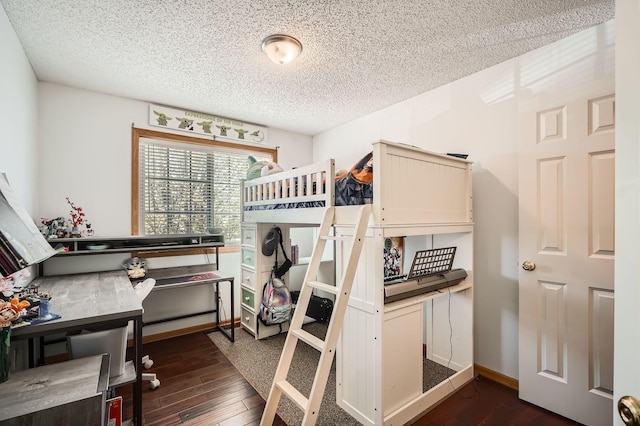 2492 Yellowstone Dr Unit 82, Hastings, MN 55033 - bedroom with a textured ceiling and dark wood-type flooring