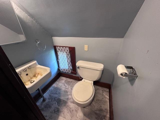 609 13th St NE, Austin, MN 55912 - half bath with toilet and baseboards
