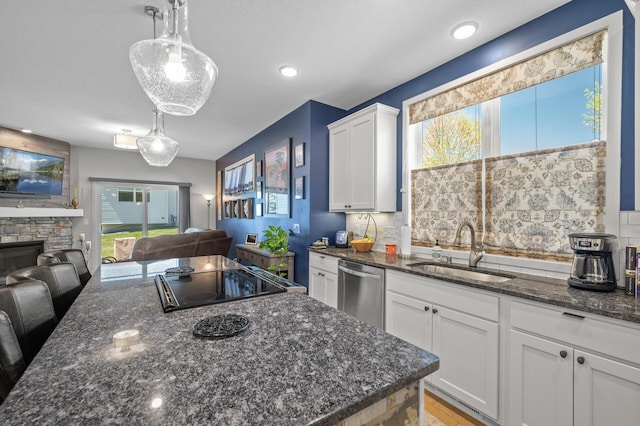 11062 16th St NE, Saint Michael, MN 55376 - kitchen featuring a sink, open floor plan, stainless steel dishwasher, plenty of natural light, and recessed lighting