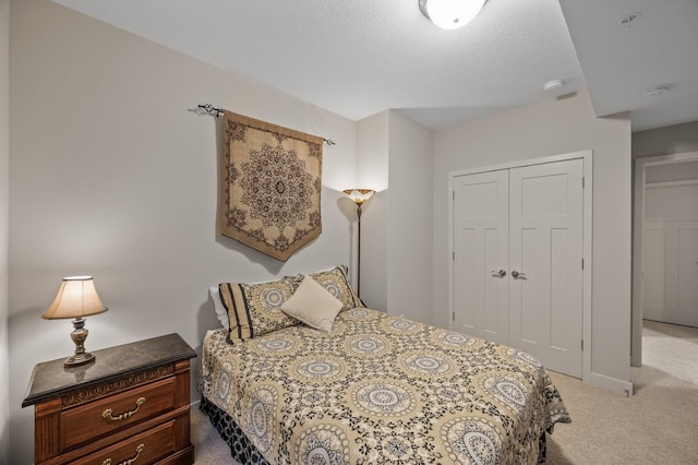11062 16th St NE, Saint Michael, MN 55376 - bedroom featuring carpet flooring, a closet, and a textured ceiling