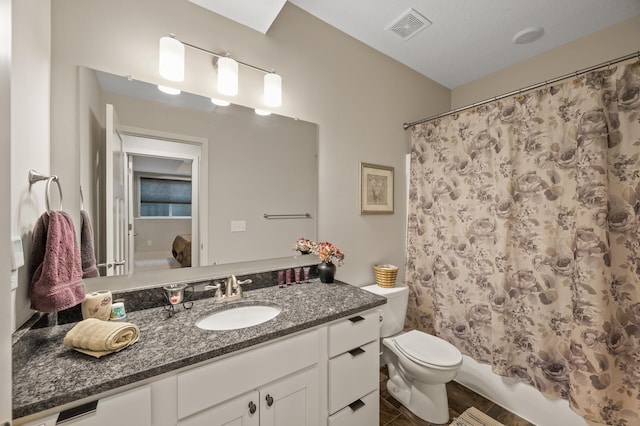11062 16th St NE, Saint Michael, MN 55376 - full bath featuring toilet, vanity, shower / bath combo, and wood finished floors