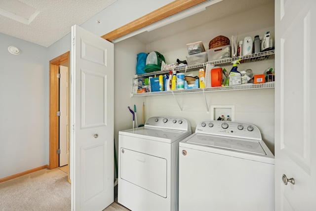 12245 Urbank St NE Unit E, Blaine, MN 55449 - washroom featuring washing machine and dryer, light colored carpet, and baseboards