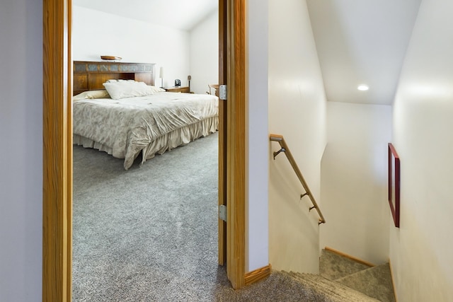 bedroom with carpet flooring and baseboards